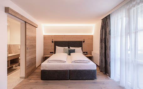 Emmy - Lodge mit Zimmer und Suiten